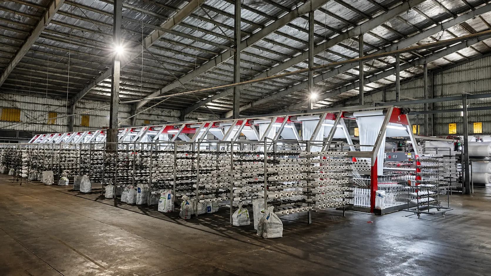 Starlinger circular loom hall and yarn creels at the KTK manufacturing operation